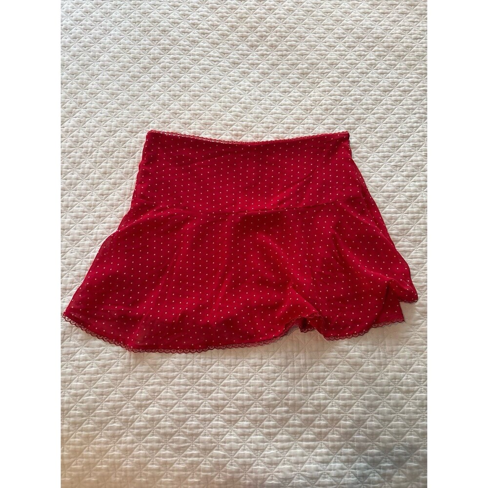 Red polka dot mini skirt with lace trim